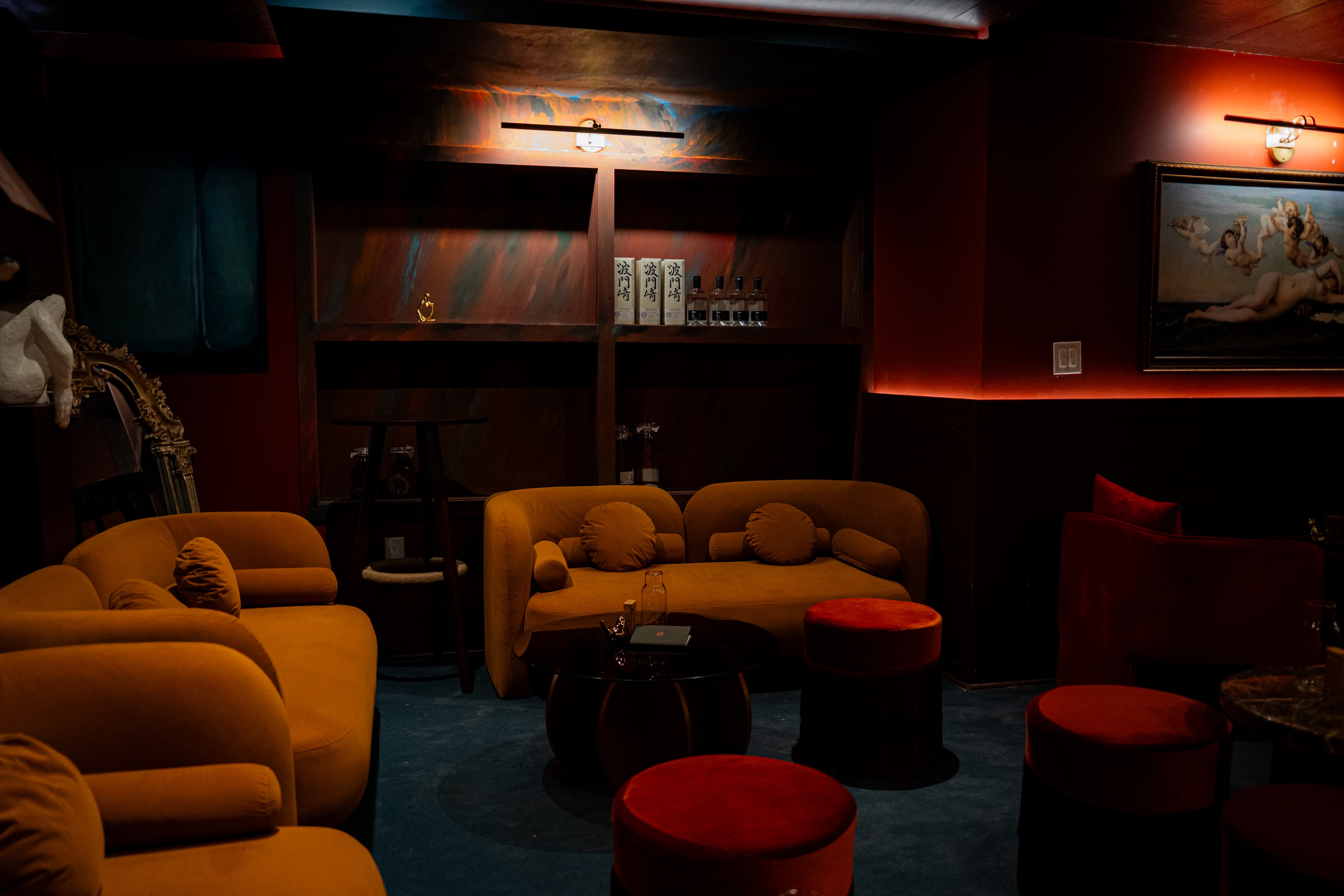 Warm Lounge seating with shelves and accent lighting at RokuNana